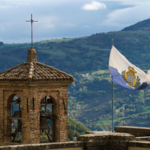 San Marino flag atop historic church