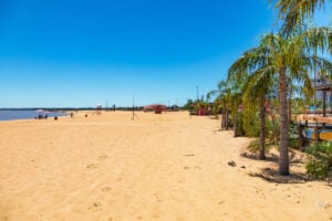 Golden sand in riverside town of Encarnacion, Paraguay