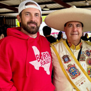 Travel Off Path Journalist Sam Sears posing with Fiesta San Antonio 2026 Rey Feo