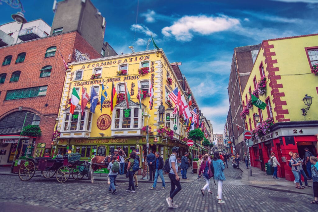 People walking through festive Dublin street