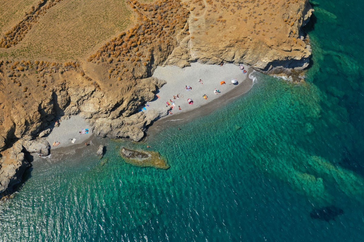 Aerial drone photo of paradise small secluded beach of Tzanakia with emerald clear sea, Astypalaia island