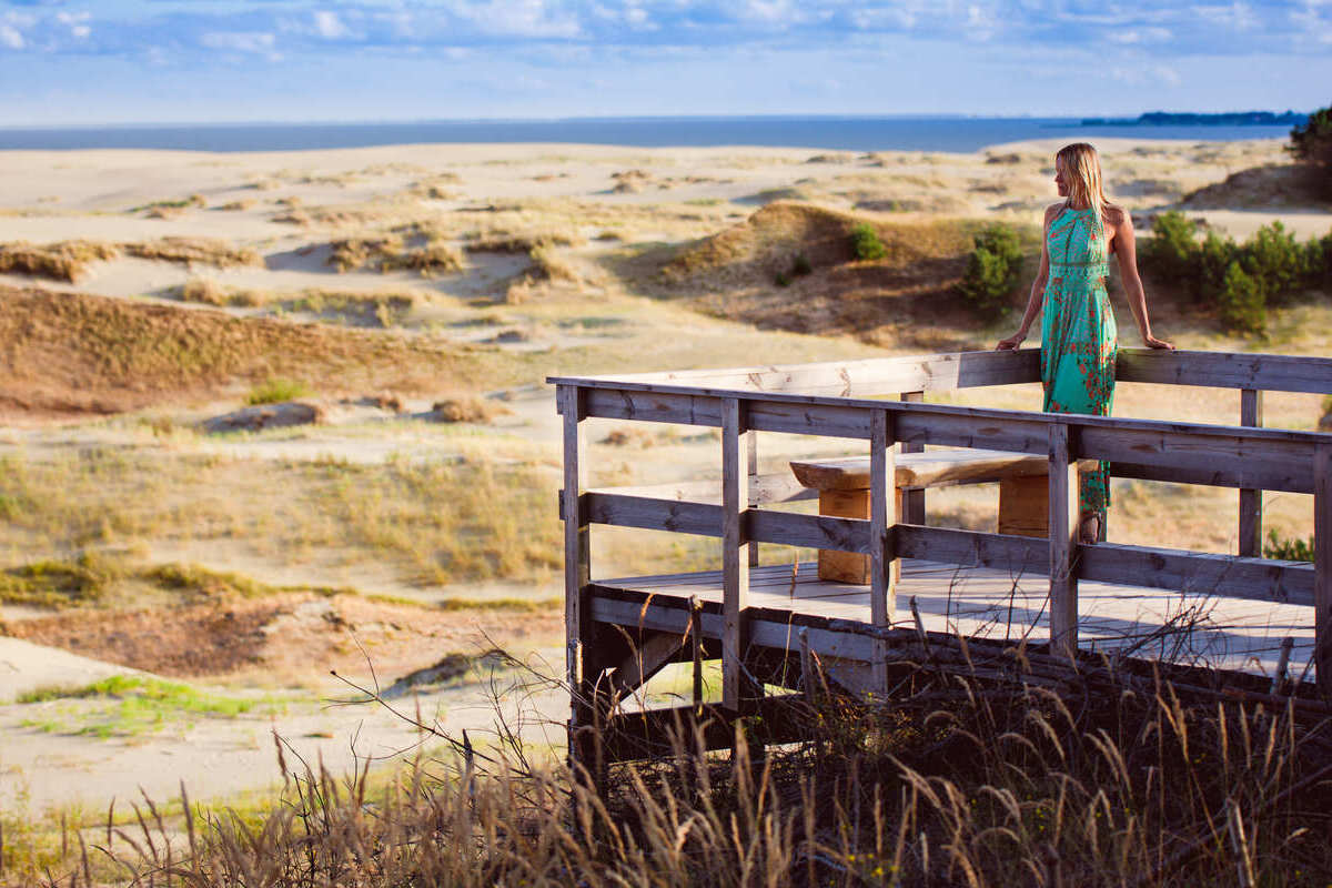 Young Woman In The Curonian Spit Between Lithuania And Russia, Northeastern Europe