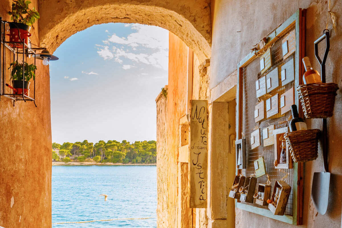 Alley Leading To The Ocean In Rovinj, Croatia