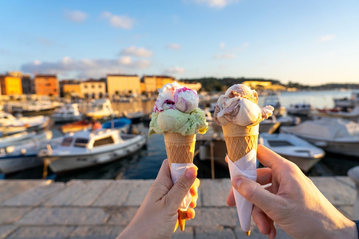 Tourists Having A Gelato In Rovinj, Croatia