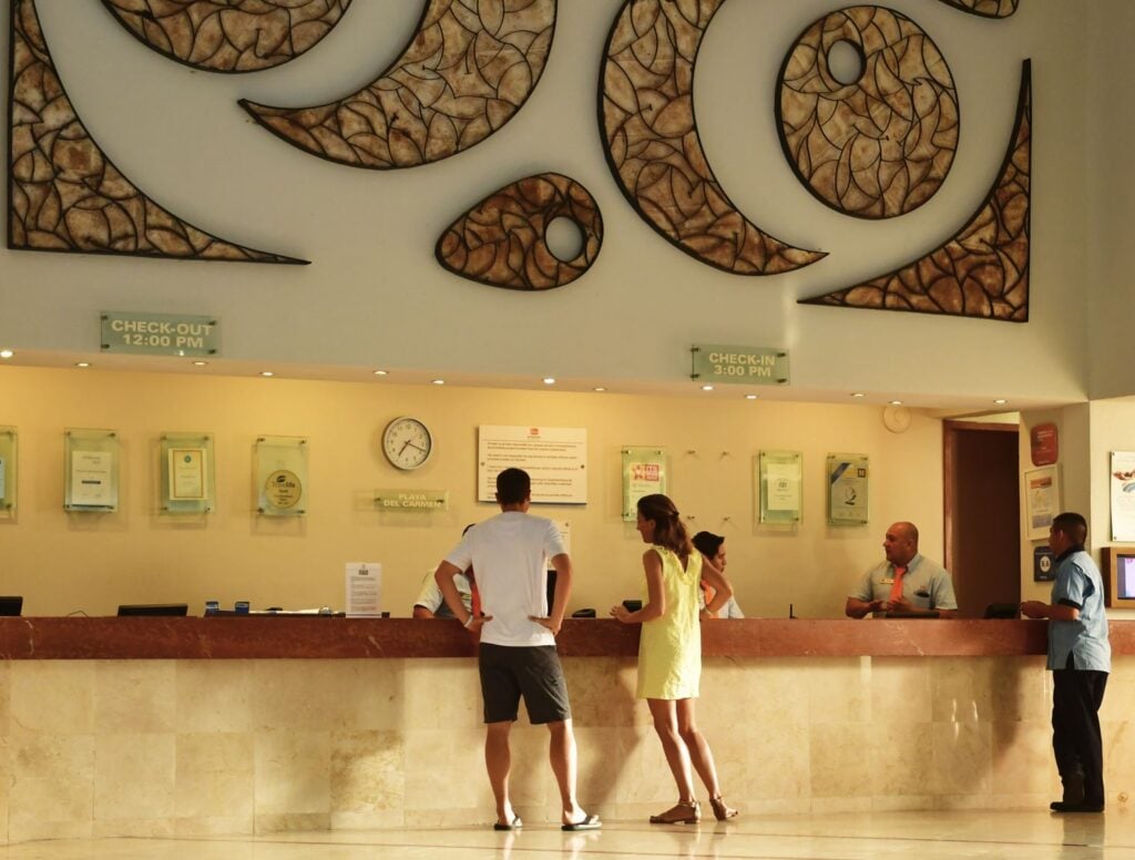 American Travelers Make Complaint At Resort Front Desk In Riviera Maya