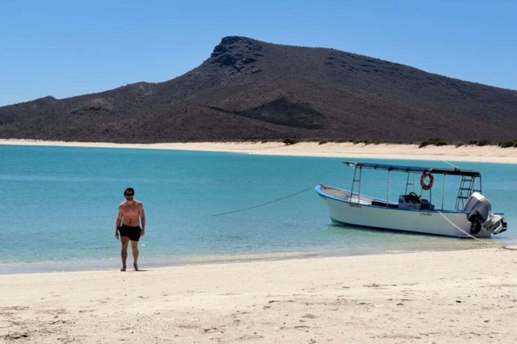 Editorial Director Tyler Fox walking along the beach on Isla Espiritu Santo