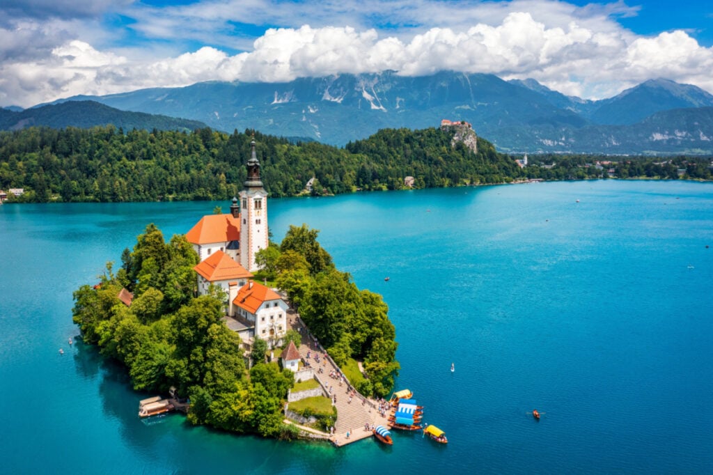 Lake Bled in Slovenia. Beautiful mountains and Bled lake with small Pilgrimage Church. Bled lake and island with Pilgrimage Church of the Assumption of Maria. Bled, Slovenia, Europe.