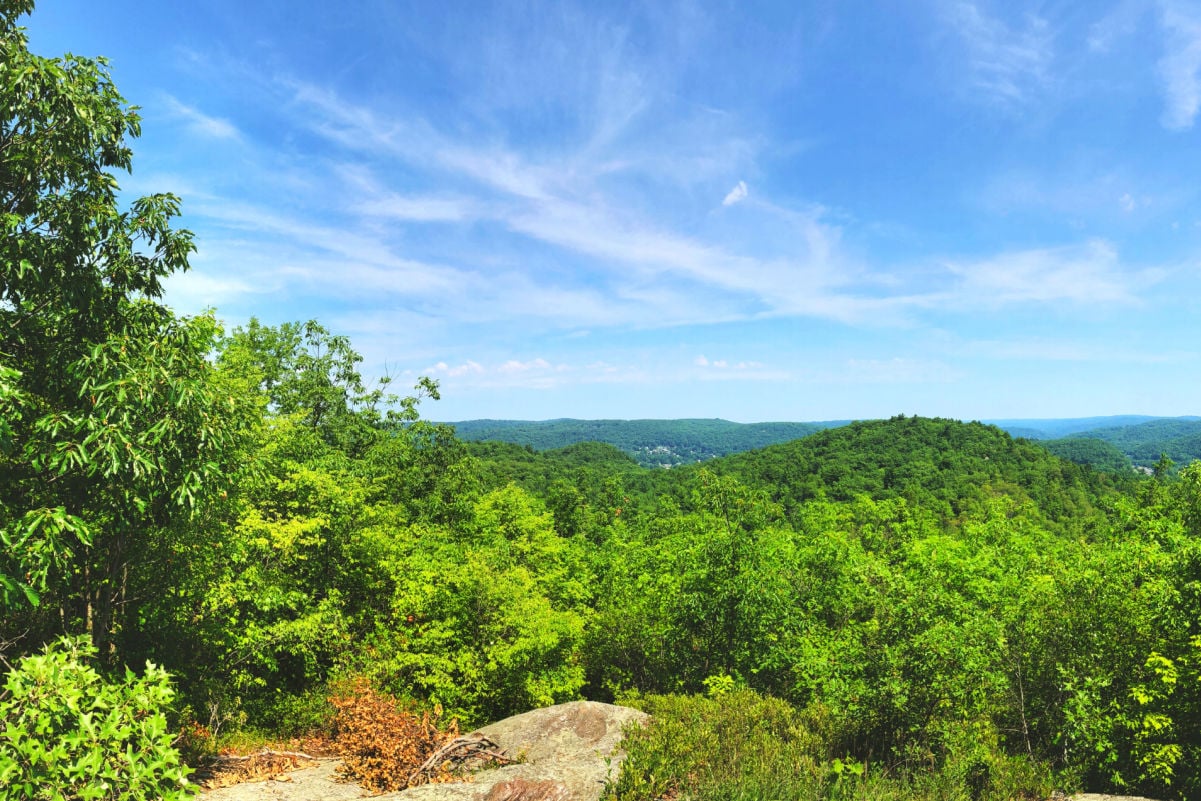 Summer scenic view north from the Mattatuck Trail that winds through Litchfield County and New Haven County at the top of Black Rock in Western Connecticut United States.