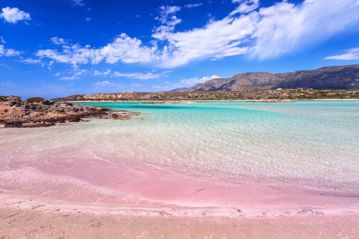 This Southern Mediterranean Island With Pink Sand, 80°F Octobers, And $15 Local Meals Is Breaking Tourism Records