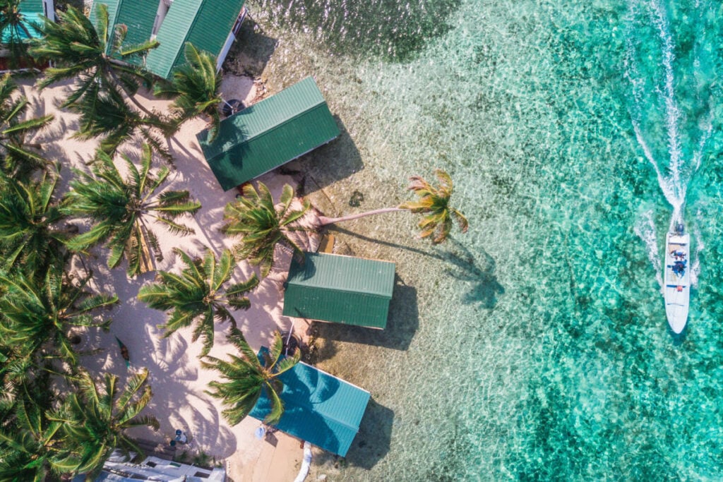 Tobacco Caye aerial in Belize barrier reef with boat