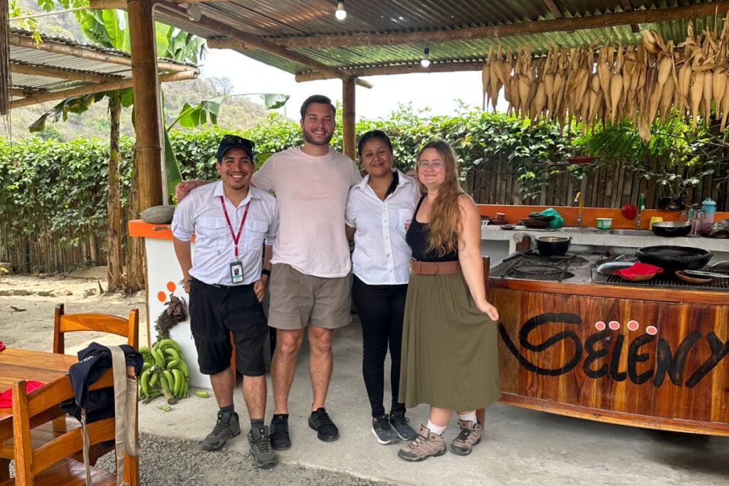 Tyler Fox in Ecuador with Chef and guide and traveler at Seleny restaurant