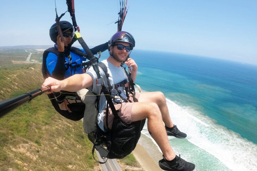 Tyler Fox paragliding over the coast in Ecaudor. Selfie by Tyler Fox