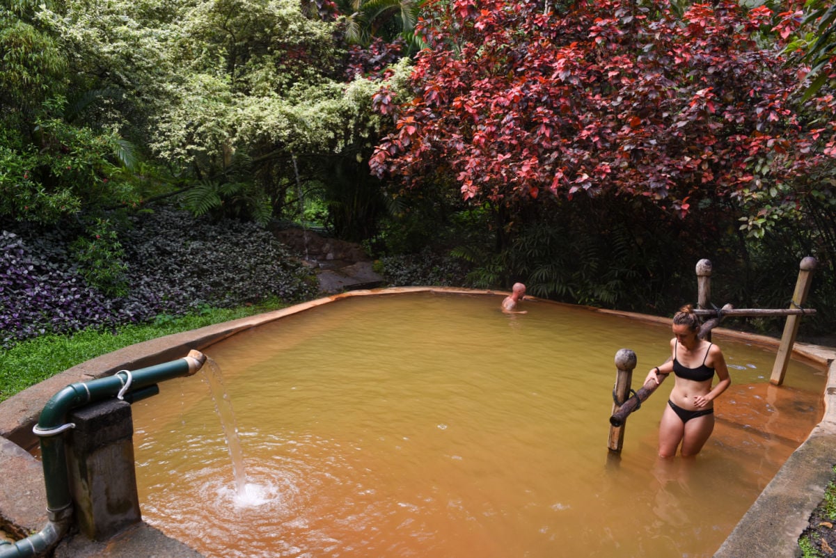 Wotten Waven, Dominica tourists on the pool at Ti Kwen Glo Cho spa in Wotten Waven on Dominica