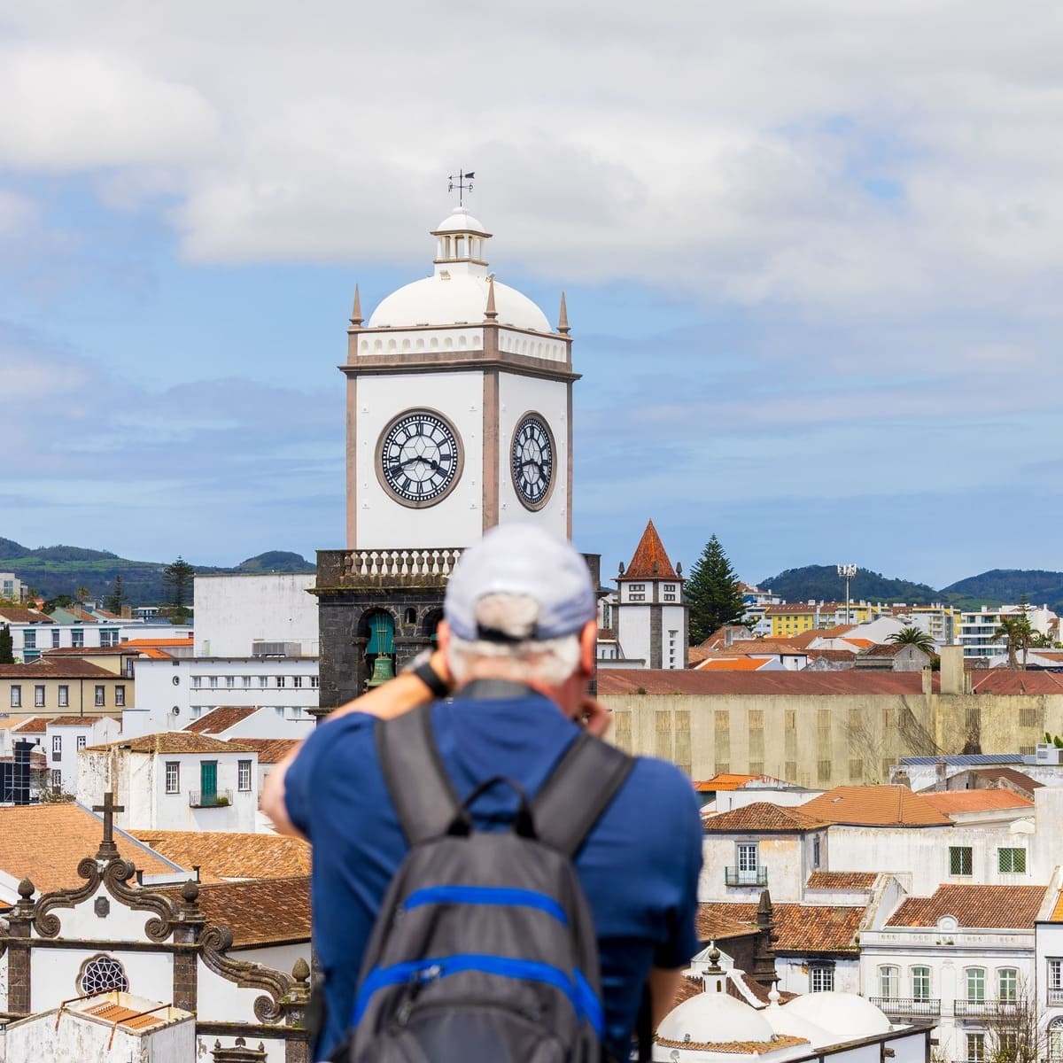 A Male Photographer Taking A Picture Of The Historic Center In Ponta Delgada, Sao Miguel Island, Azores, Portugal