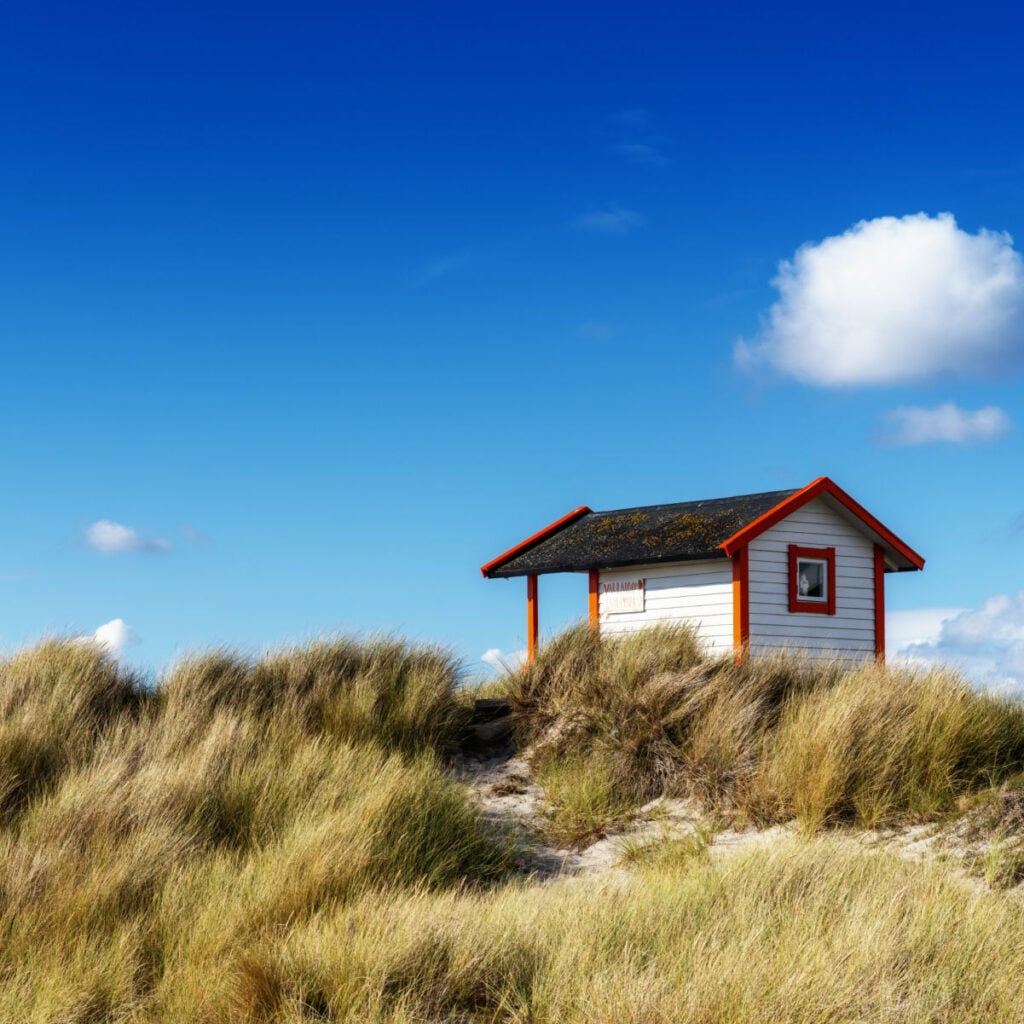 A view of a colourful Badhytta cottage on the Swedish Riviera of the Falsterbo Peninusla