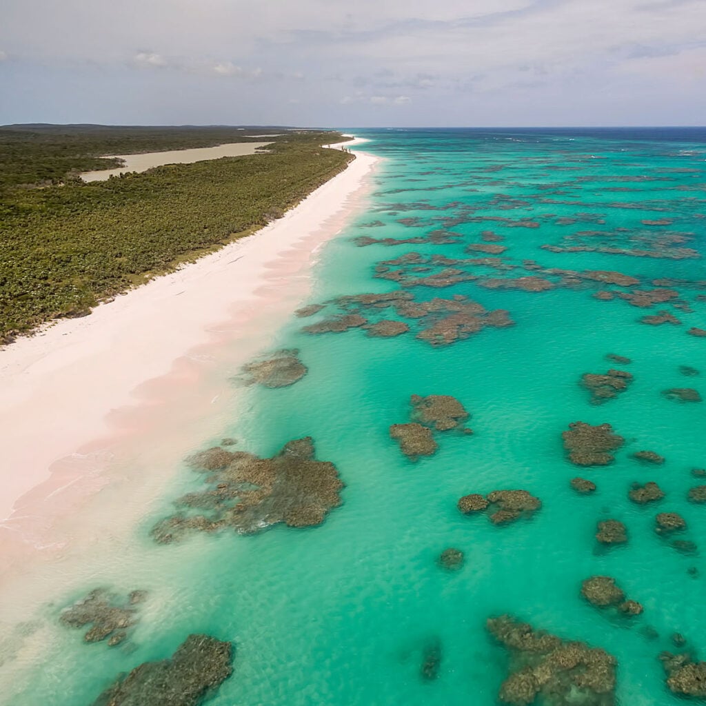 Aerial view of the dotted coral formations along the Atlantic Ocean side of Cat Island, Bahamas