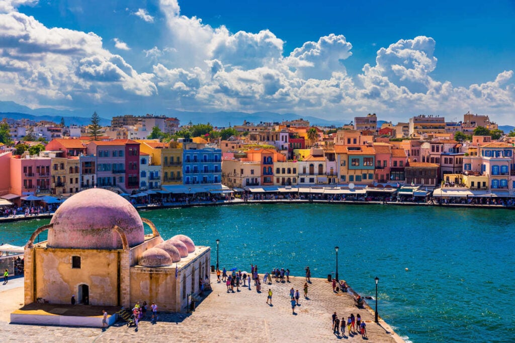 Americans Are Flocking To This Underrated Island City In Greece With 75°F Autumns, $15 Seafood Dinners, And $70 Oceanfront Hotels