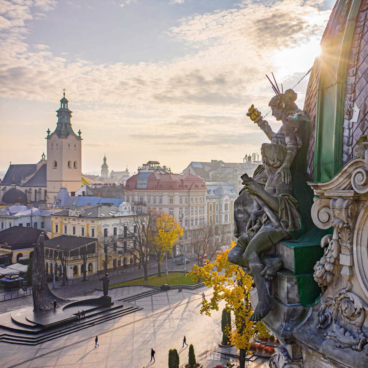 Beautiful Zoomed In View Of A Sculpture On The Side Of A Church Dome, Overlooking Lviv Historic Center, Ukraine