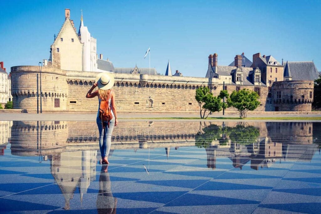 I Live In France And Tell Friends To Skip Paris For These 5 Underrated Cities With Moated Castles, Volcanic Cathedrals, And $80 Hotels