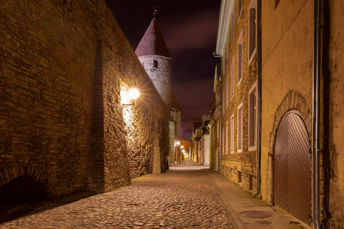 Lamp Lit Cobbled Street In Tallinn Old Town, Estonia