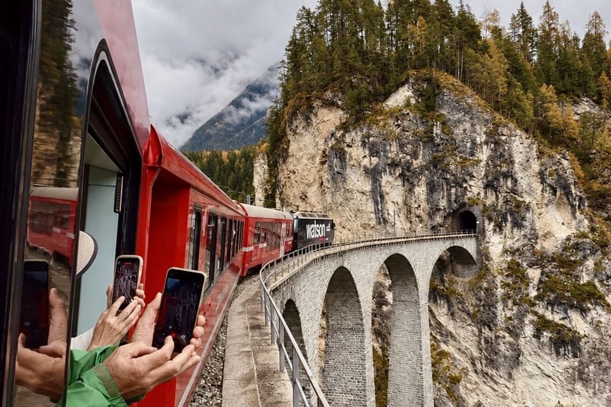 Landwasser Viaduct As The Red Regional Train Passes It, Bernina Albula Line, A Scenic Train In Switzerland
