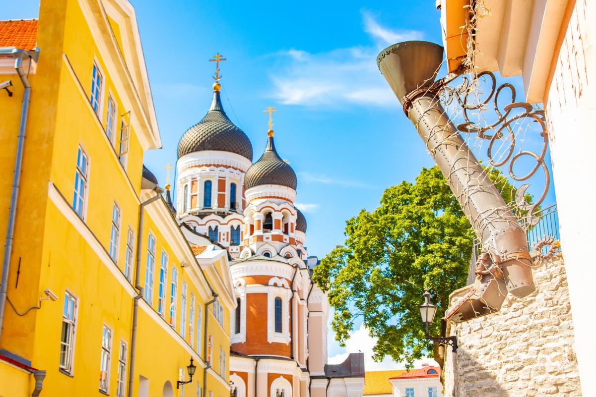 Long Leg Street in Tallinn old town, Estonia. Selective focus on boot shaped drainpipe