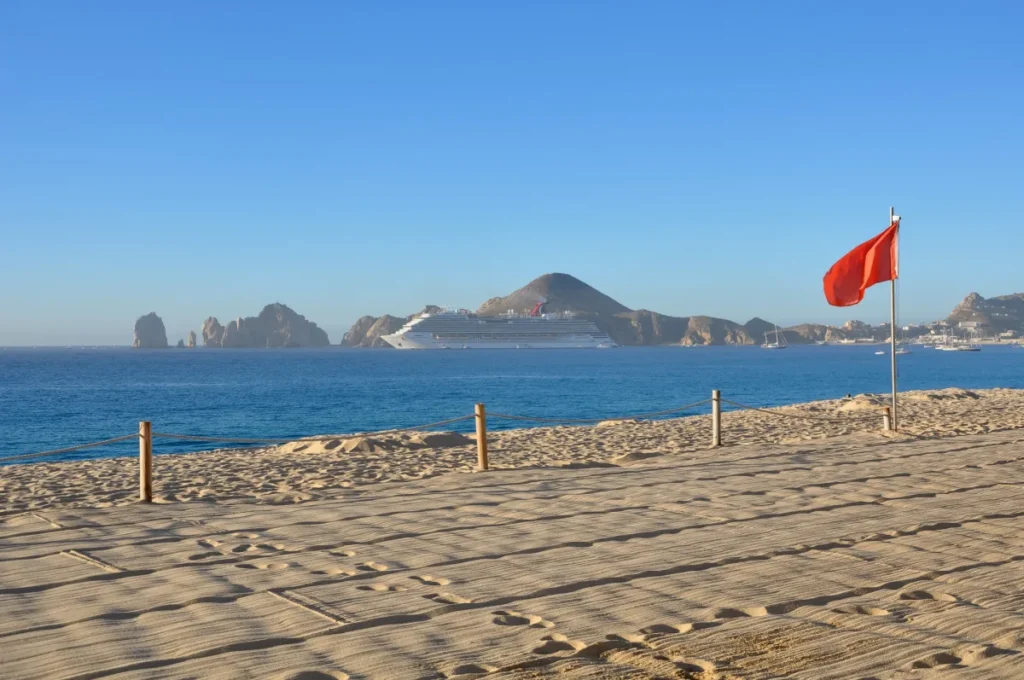 Red-Warning-Flag-on-Medano-Beach-in-Cabo-San-Lucas-Mexico.jpg