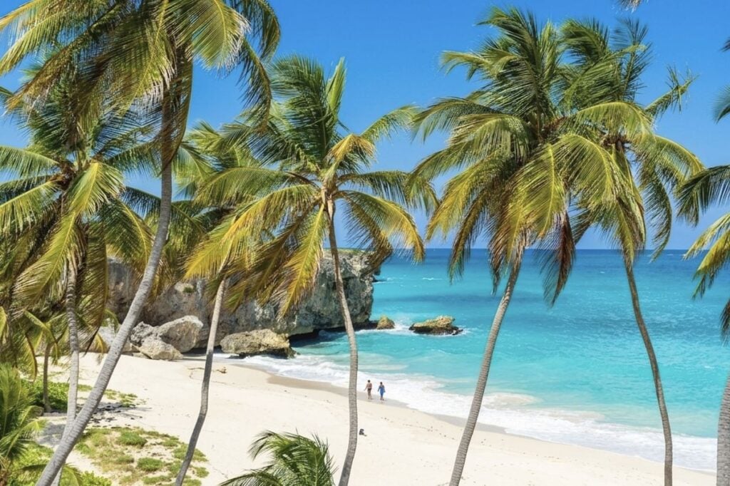 This English-Speaking Caribbean Island With 80 White Sand Beaches, 83°F Winters, And $5 Rum Punch Is Breaking Tourism Records