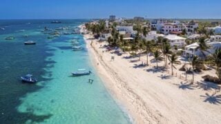 This Safe Mexican Beach Town Only 30 Minutes From Cancun Has White Sand, 85°F Octobers, And $1 Tacos
