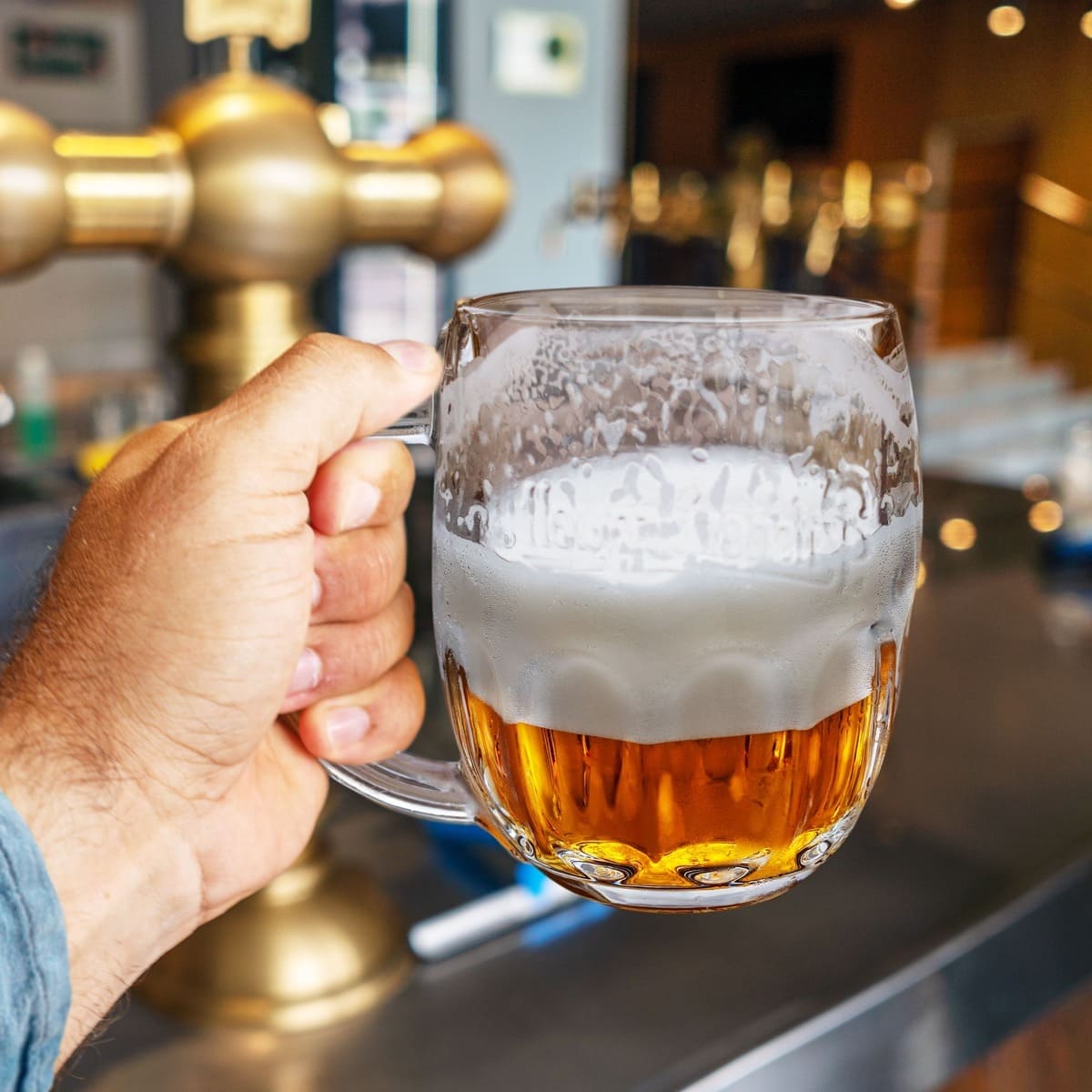A Tourist Enjoying Local Beer In Czechia, Central Europe