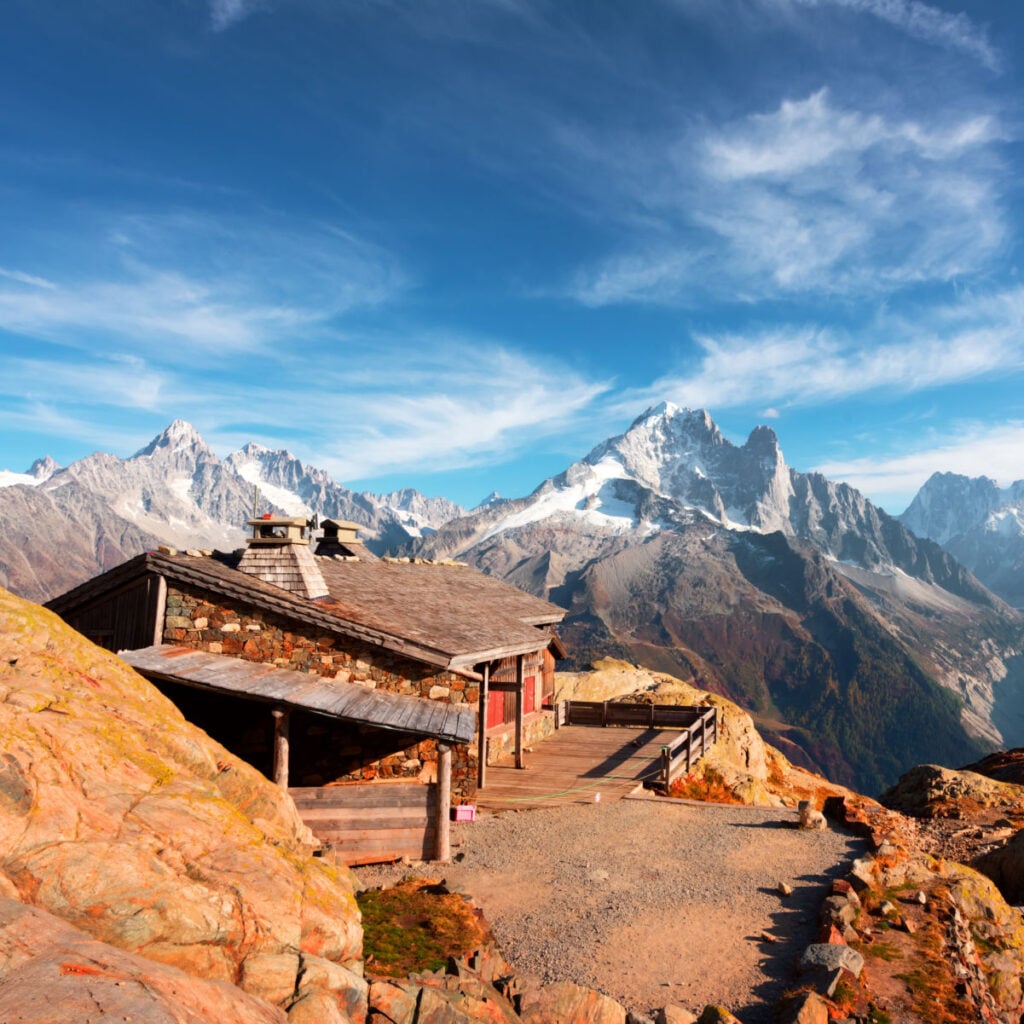 Cabin on Lac Blanc lake in France Alps. Monte Bianco mountain range on background. Vallon de Berard Nature Preserve, Chamonix, Graian Alps. Landscape photography