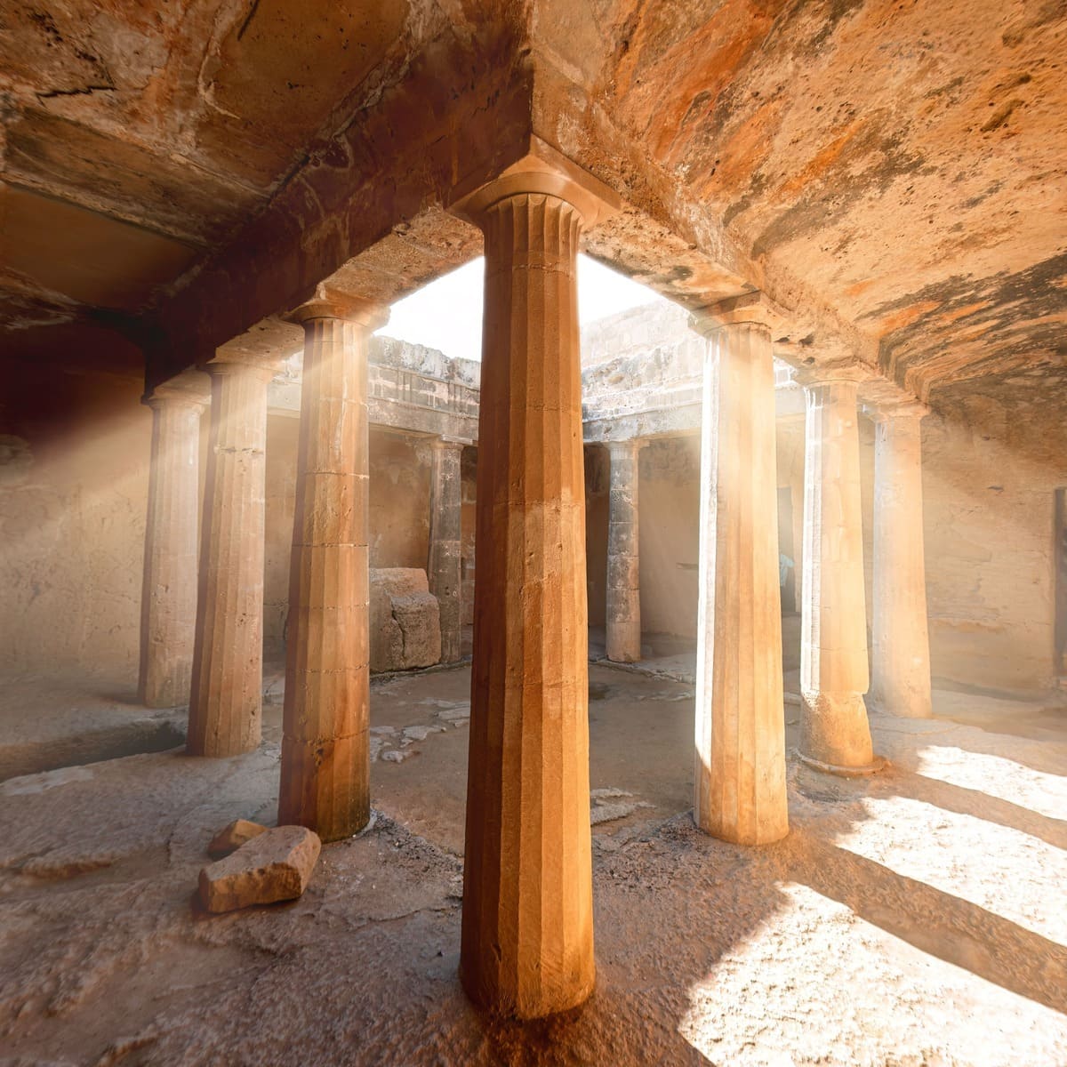 Sun Streaks Coming Down Into The Underground Burial Sites Of The Tombs of the Kings, A UNESCO World Heritage Site In Paphos, West Cyprus, Eastern Mediterranean, Southern Europe