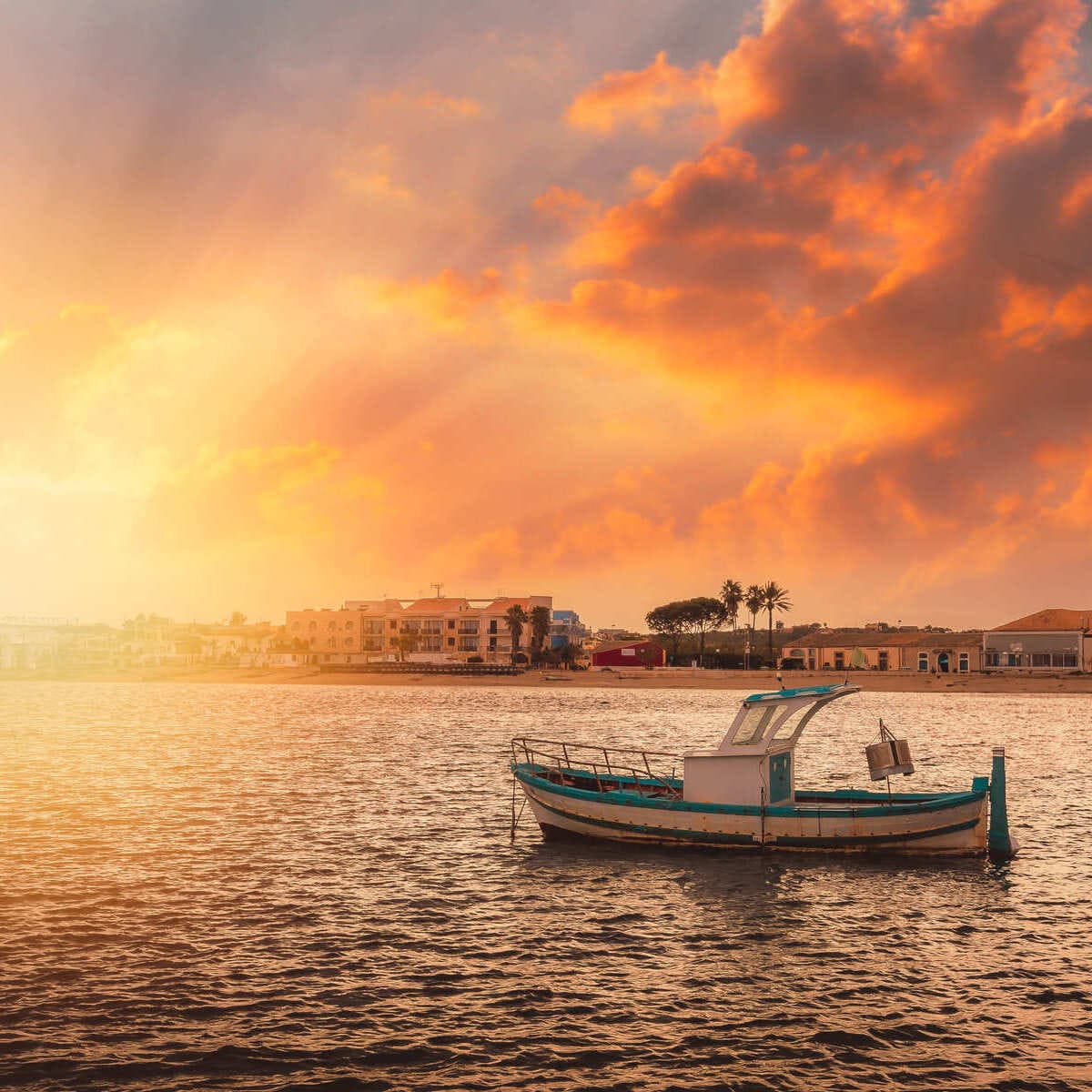 The Sun Setting Over The Coastal Village Of Marzameni In Sicily, Italy