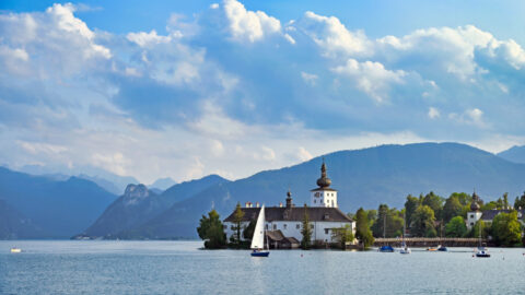 Water Castle Schloss Ort Orth on lake Traunsee in Gmunden landscape, Austria